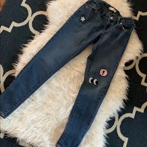 Levi’s 710 Super skinny jeans with patches